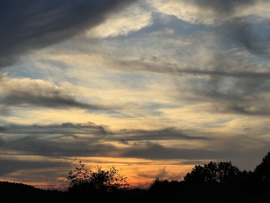 Clouds Make For A Beautiful Sunset by calm