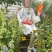 Gladys welcomes visitors to her garden