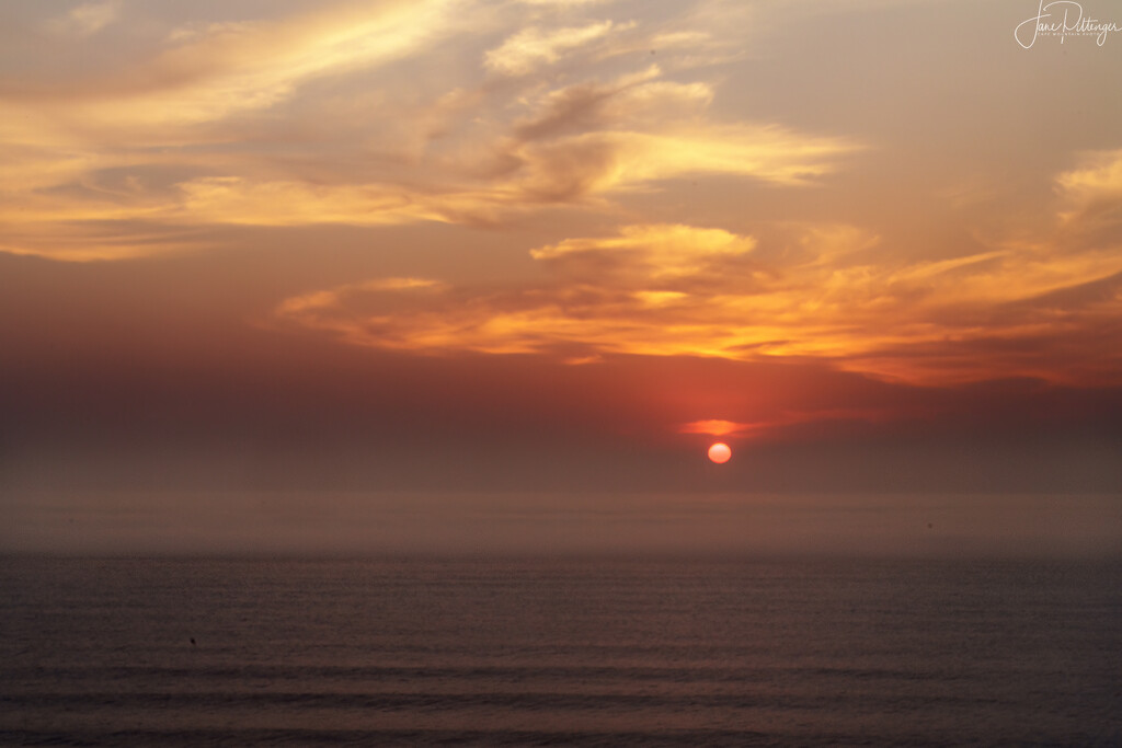 Sun Falling Into the Ocean  by jgpittenger