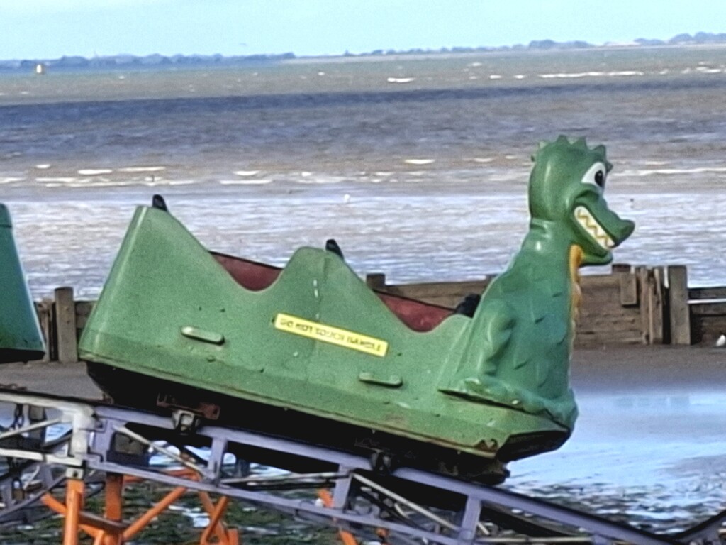 1000018908Day 256/366. 'Clapped out, run down, too old to save...' An old mini dragon rollercoaster on the beach.  by fairynormal