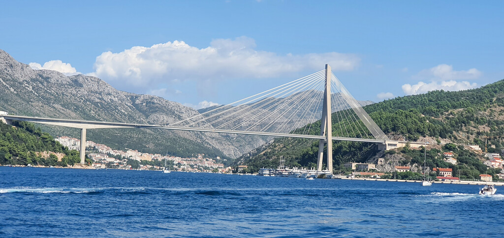 Suspension Bridge From the Sea by hannahcallier