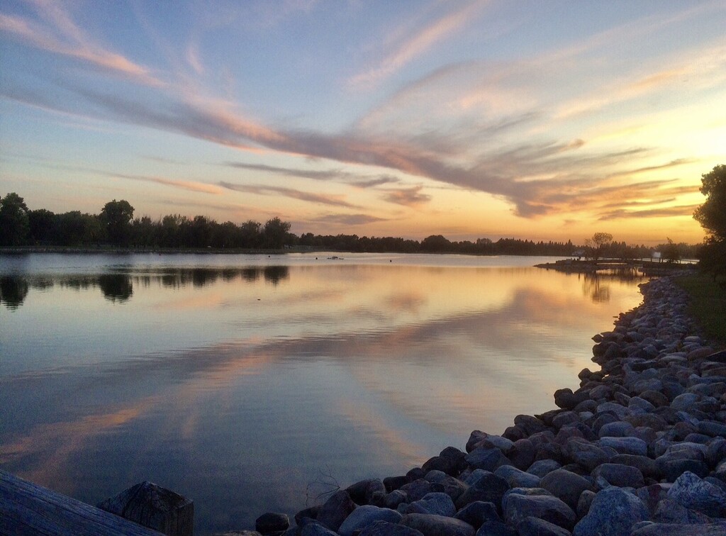 Sunset and Clouds Refection by dailypix