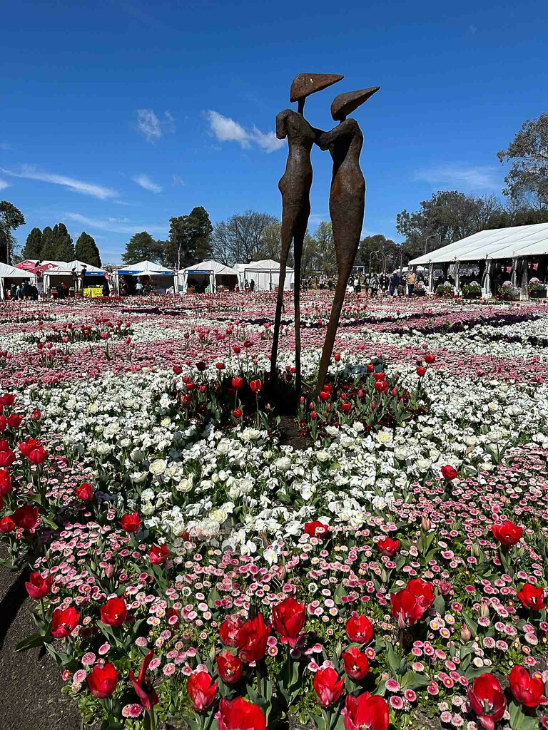 Sculpture in the flowers by pusspup