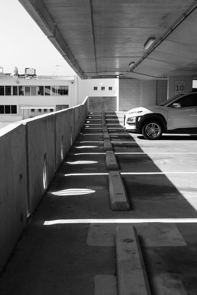 Shadows in the carpark.  by jeneurell