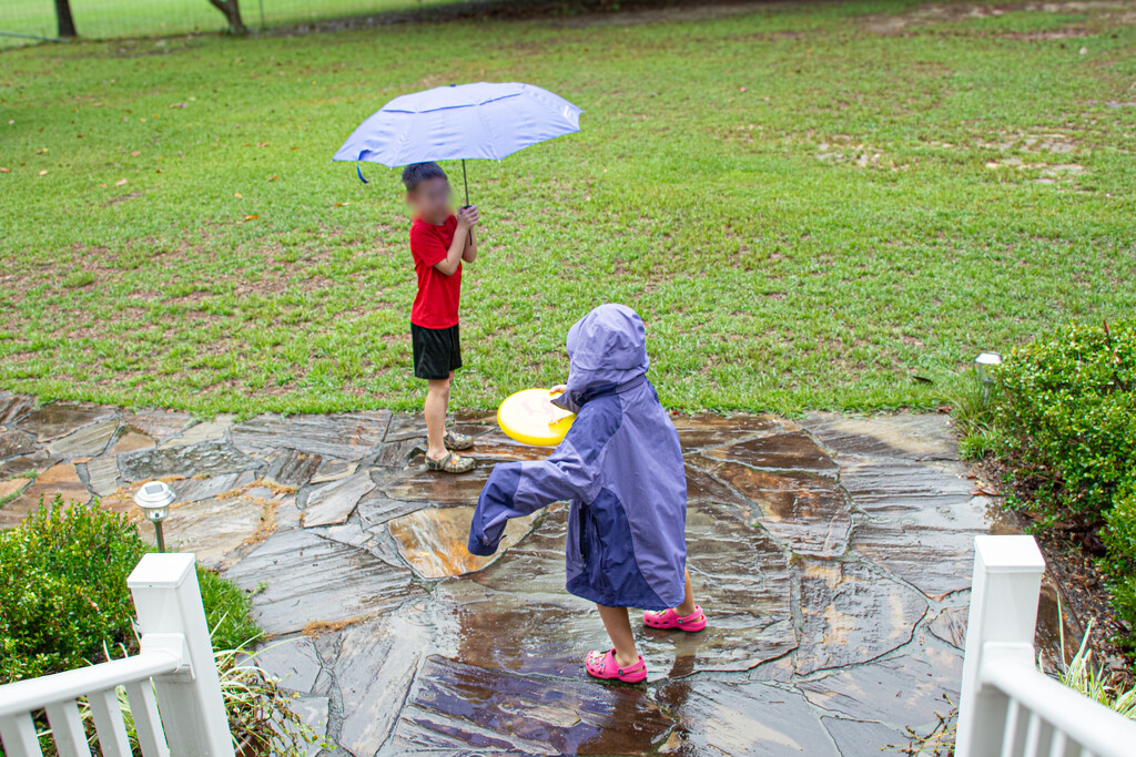 Playing in the rain... by thewatersphotos