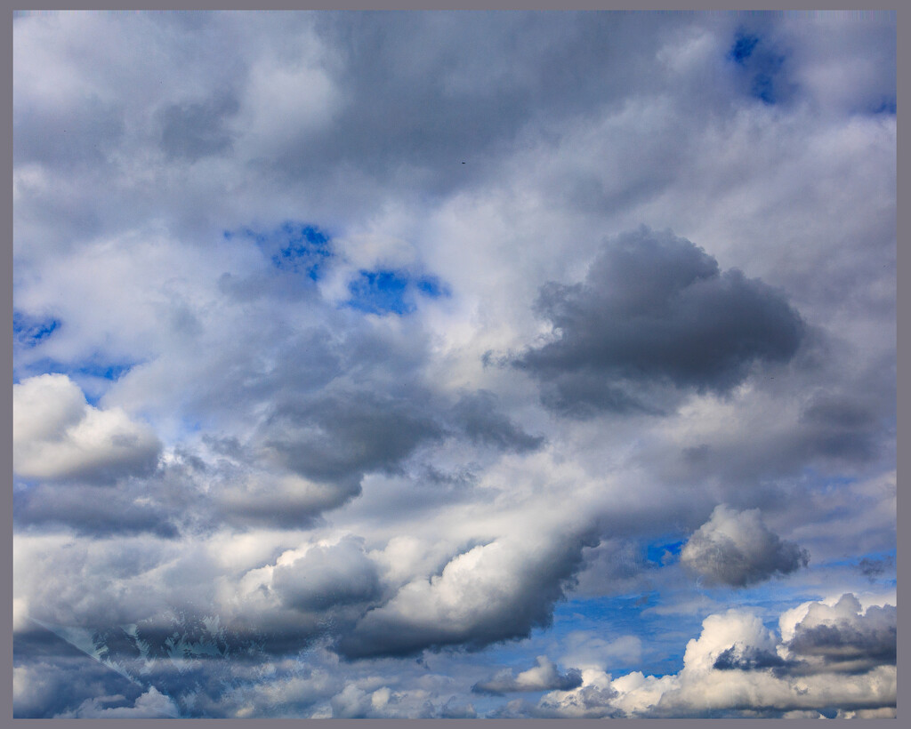 Clouds through the Window by hjbenson