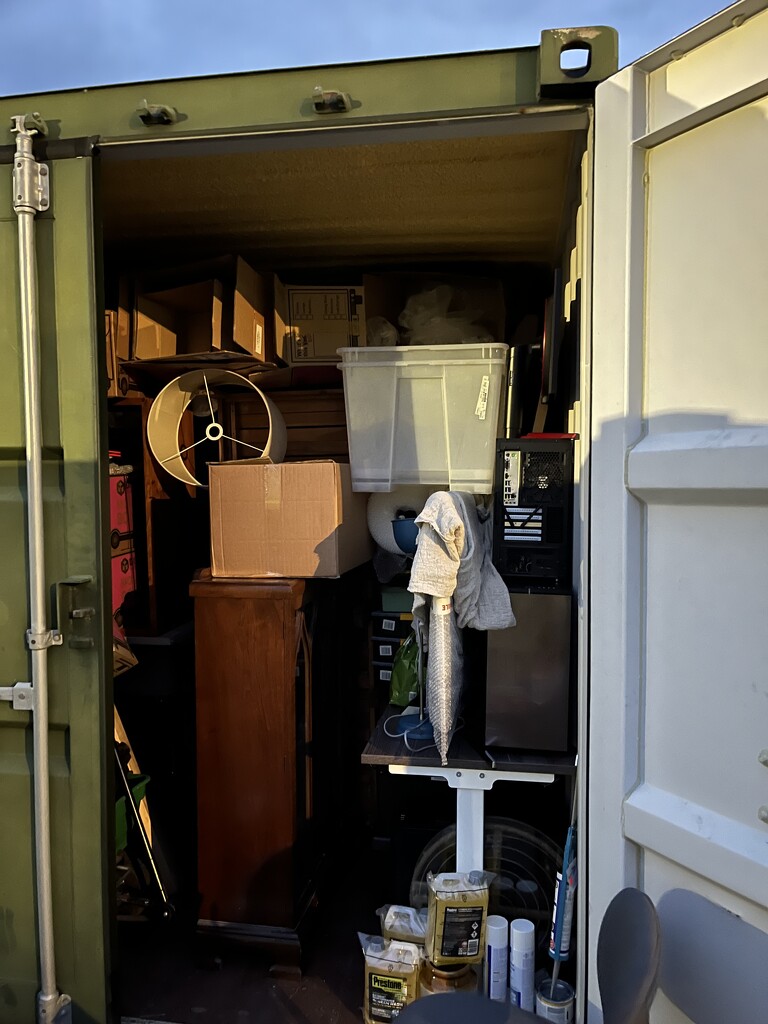 Loading the container with a new cabinet by helenawall