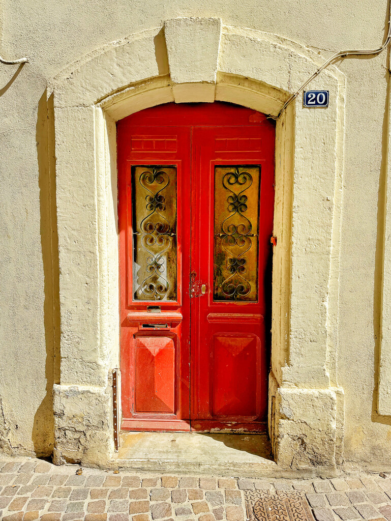 8 hearts on a red door.  by cocobella