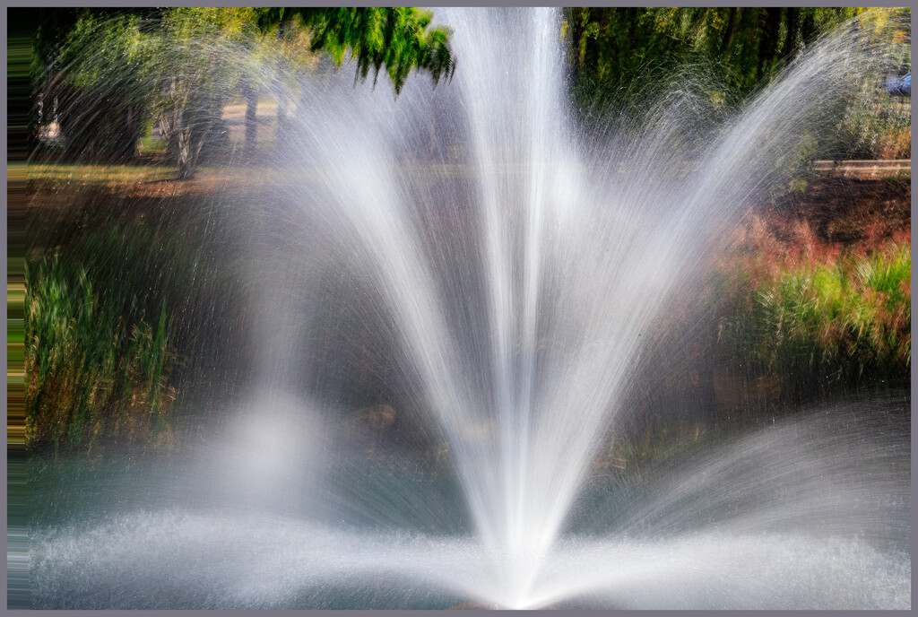 Fountain in Pond by hjbenson