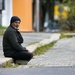 Sitting on the curb