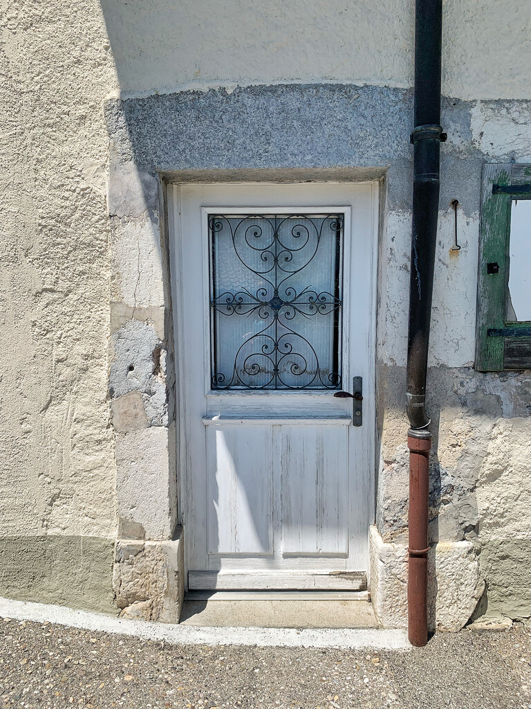 Six hearts on a white door.  by cocobella