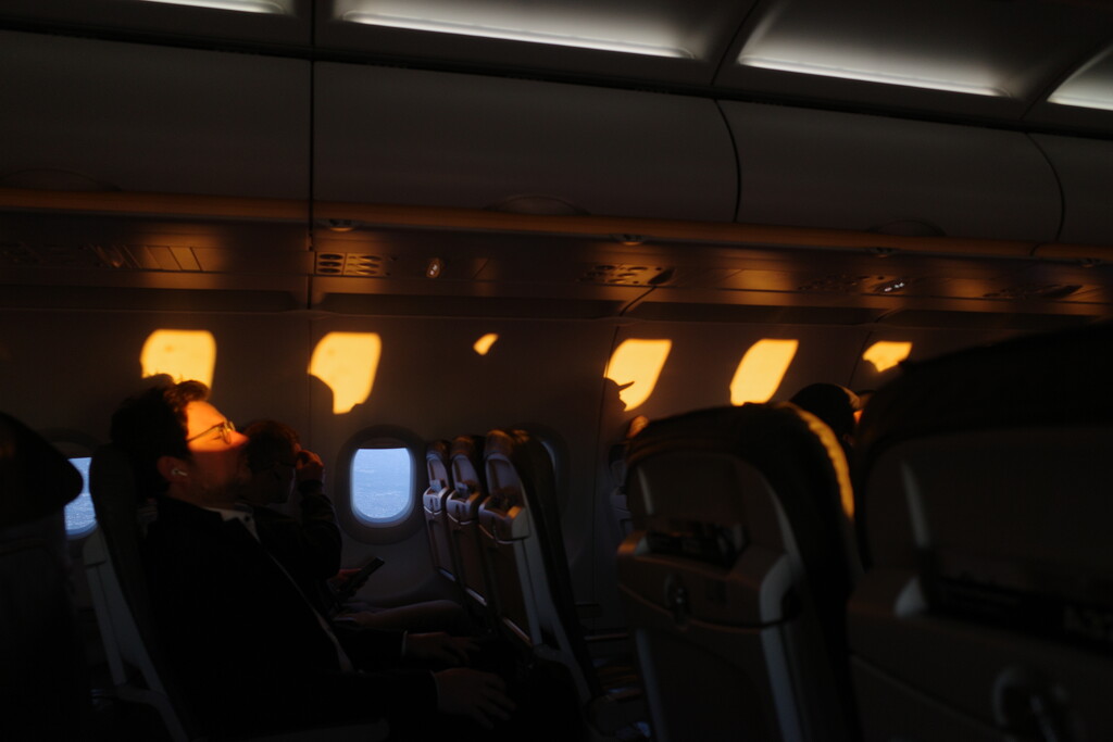 Sunset Silhouettes at 30,000 Feet by vincent24