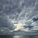 Charleston Harbor light, skies and sunrays