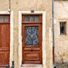 Two hearts on a brown door. 