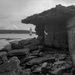 Harbour light and stone structure by peterdegraaff