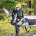 Girl feeding pigeons