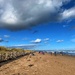 Sea, sand, clouds and walkers….