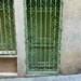 Green door with hearts. 