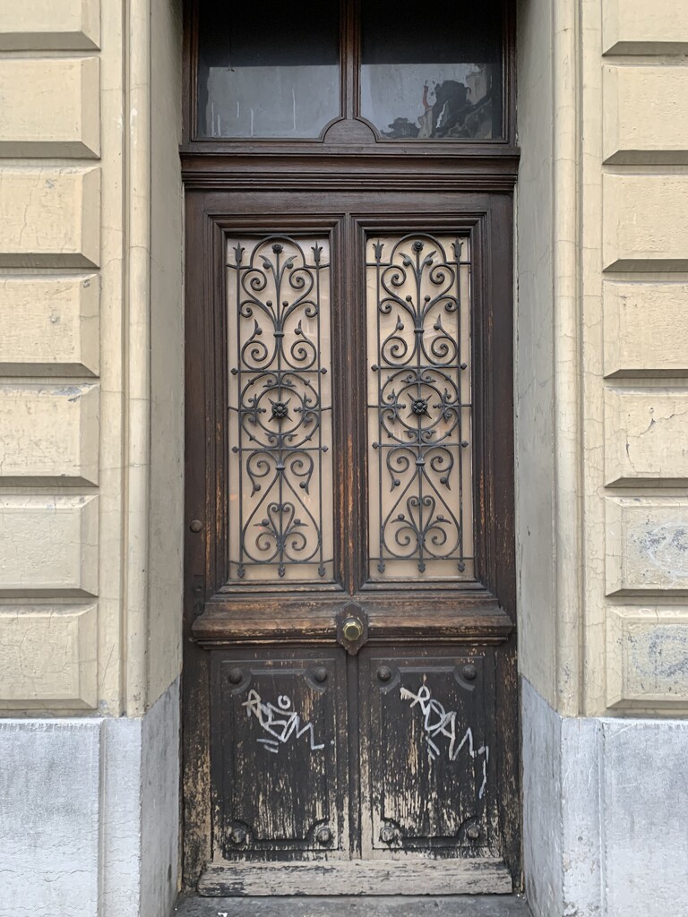 Four elegant hearts on an old door.  by cocobella