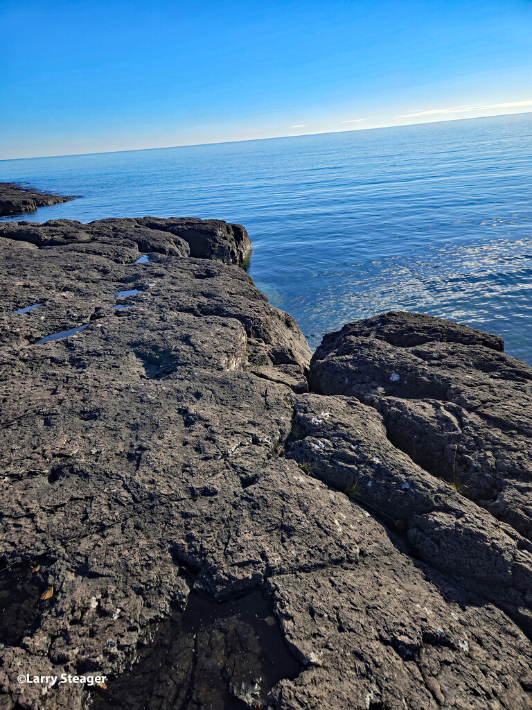 Lava flow on the Lake Superior shore by larrysphotos