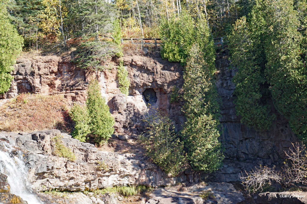 Caves beyond the waterfall by larrysphotos