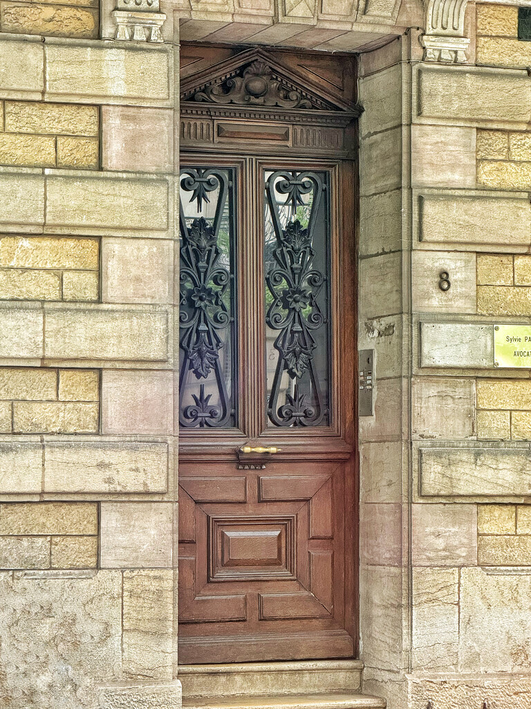 Hearts and flowers on a door.  by cocobella