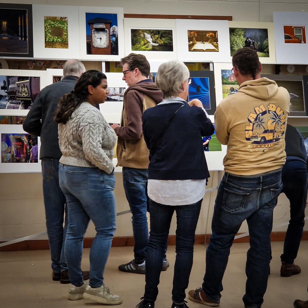 Admiring the prints by andyharrisonphotos