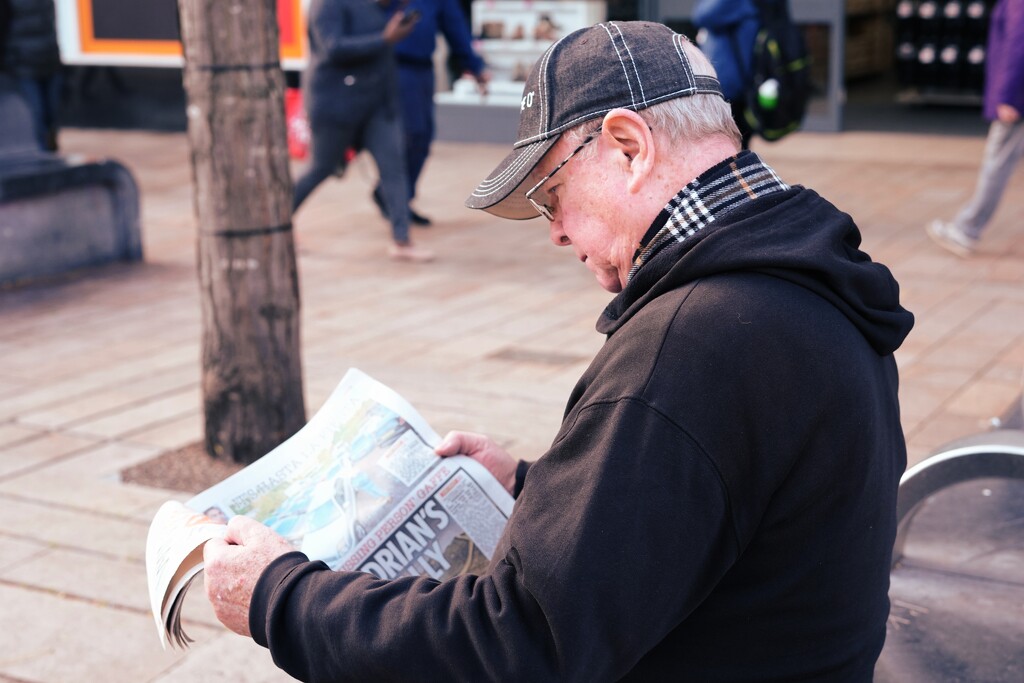 300/366 - Newspaper man  by isaacsnek