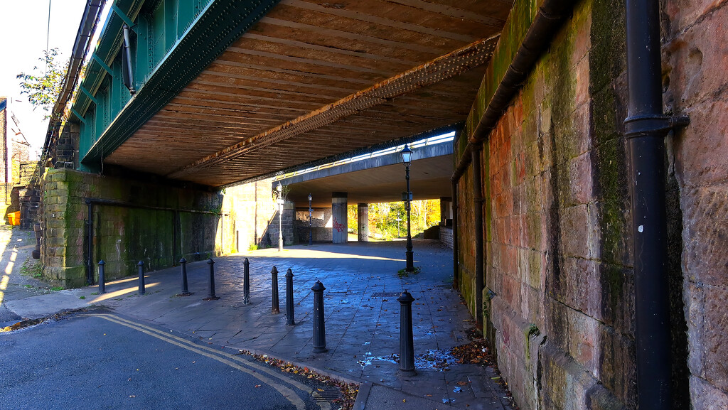 Pedestrian path under a rail track and major road. by neil_ge