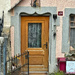 Two hearts on a brown door. 