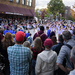 The gathering crowd watches a Generations Dance group perform in the middle of uptown