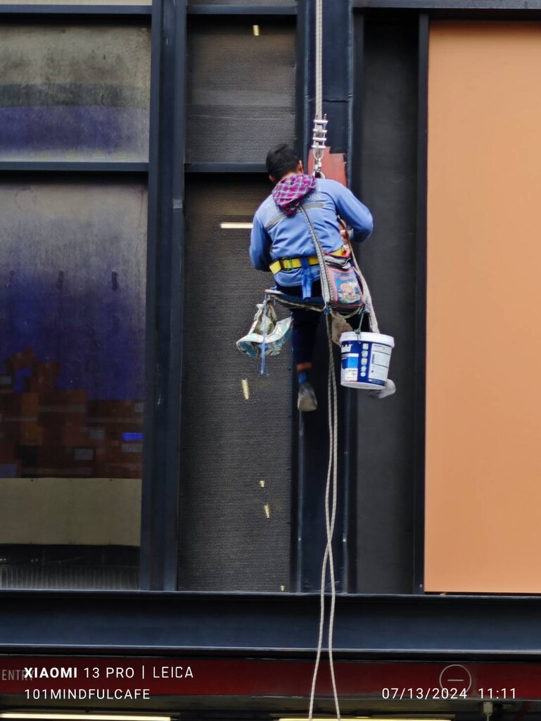 Window Cleaner in Action by 101mindfulcafe