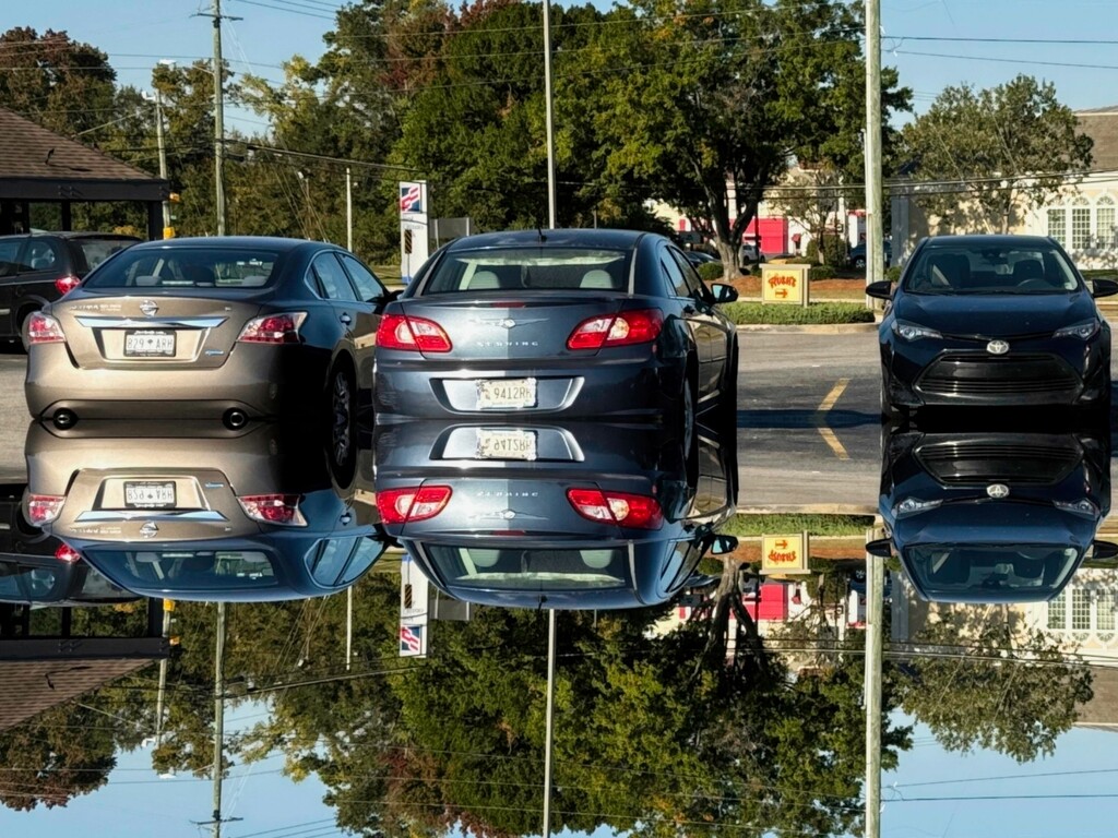 Mirrored in the parking lot... by marlboromaam