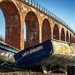 Lady Eveleen sits below the railway bridge.