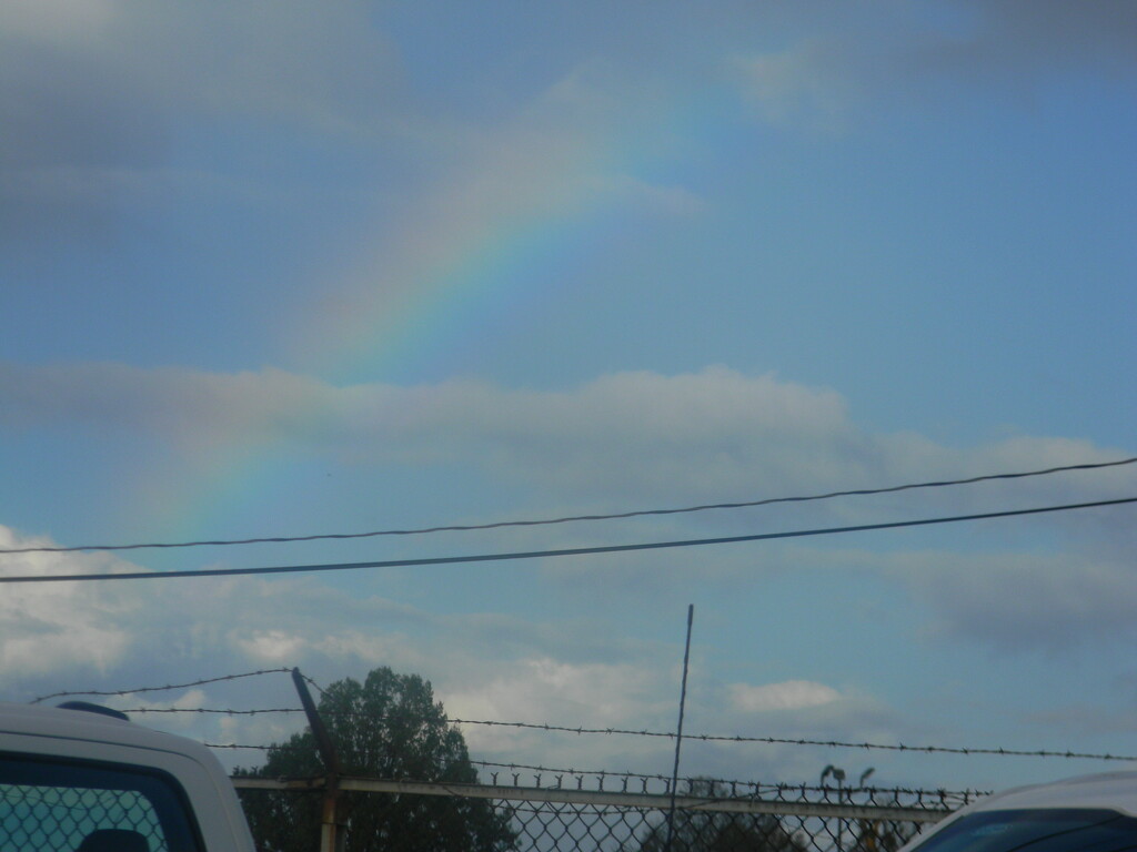 Rainbow Crossing Cloud by sfeldphotos