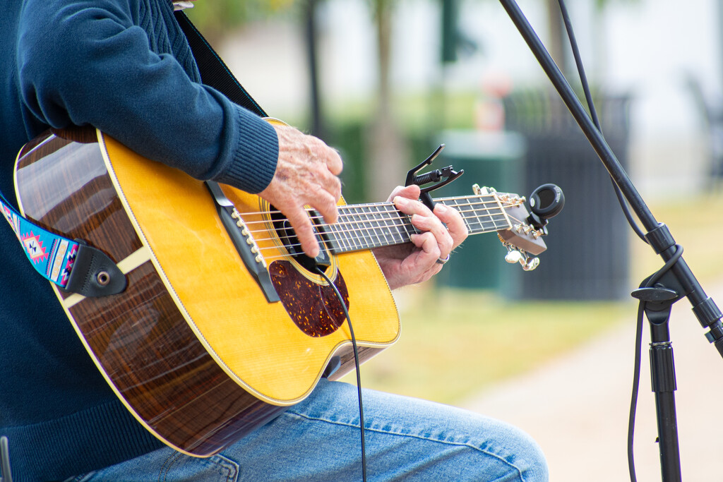 Playing guitar... by thewatersphotos