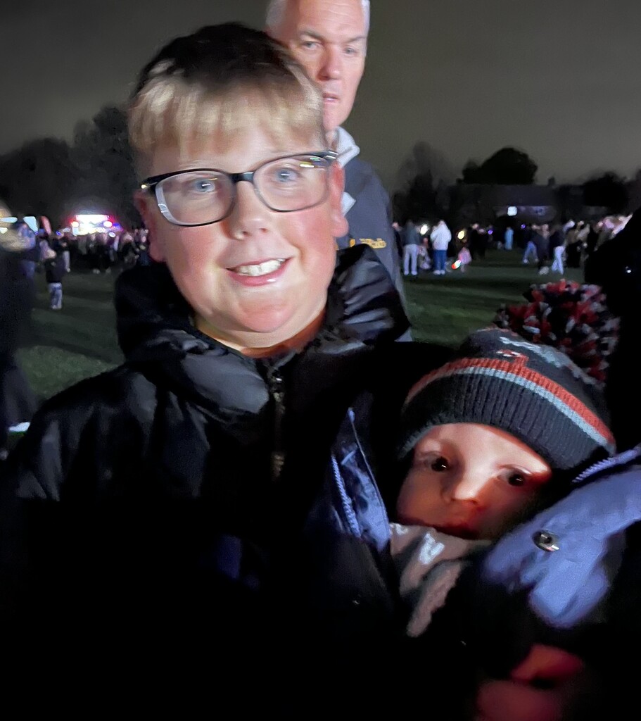 Ollie with baby Archie at the firework display... by anne2013