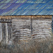 Barn with a blue roof by haskar