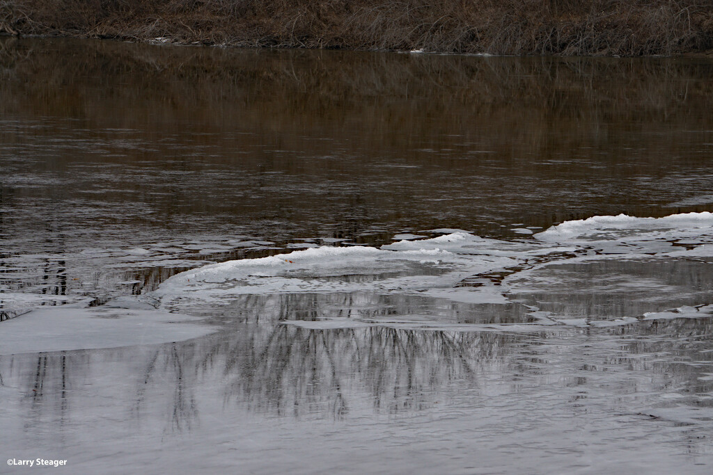 Reflection in partical frozen lake by larrysphotos