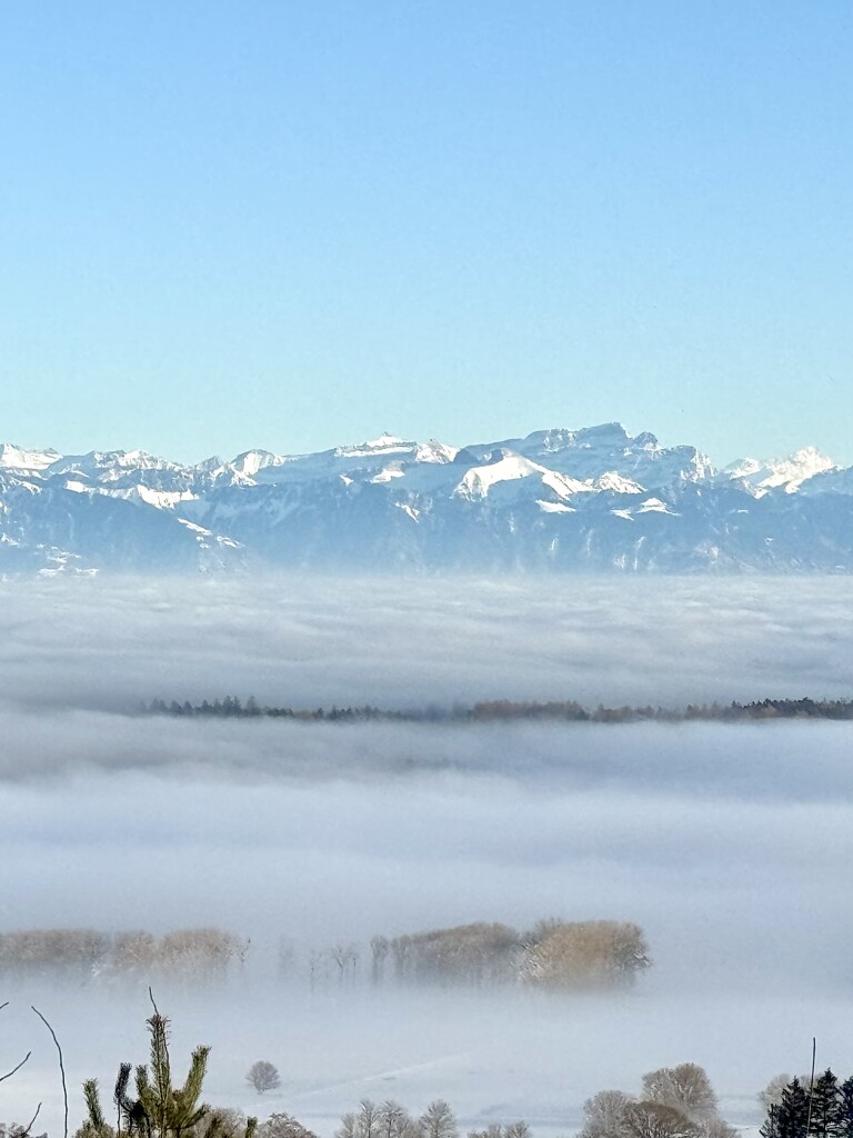 Mountains and an ocean of clouds.  by cocobella