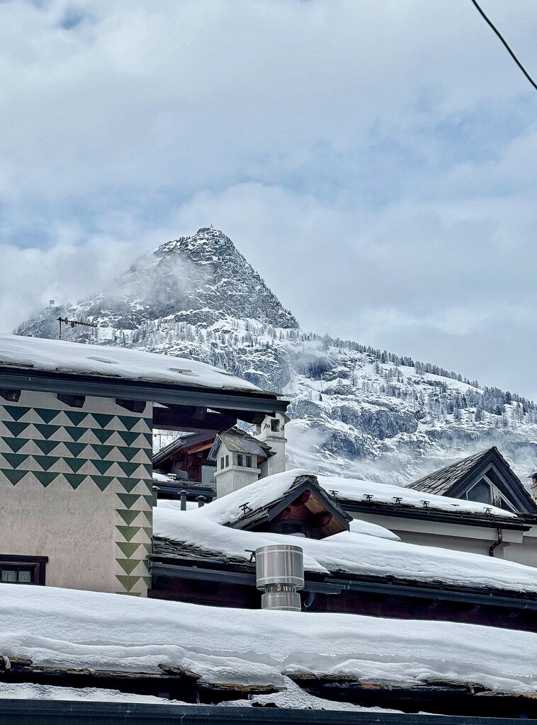 Roofs with snow.  by cocobella