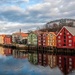 The piers are reflected in the river by elisasaeter