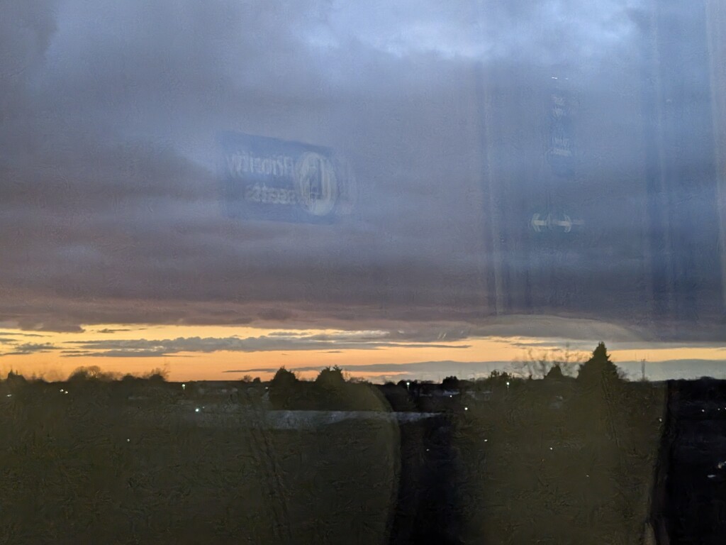 Train window sunset by topcat1701