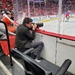 Photographer at a Hockey Game