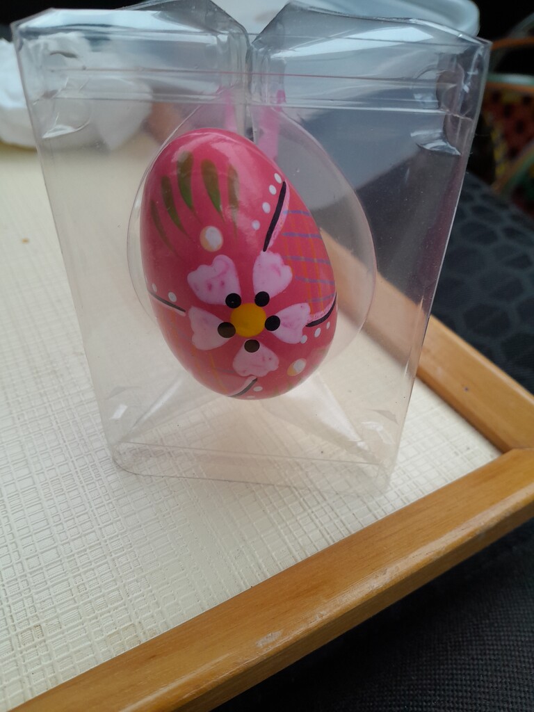 egg in a chocolate orange holder by anniesue