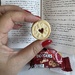 A book and a heart cookie. 
