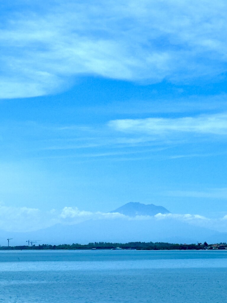 A volcano in the clouds.  by cocobella