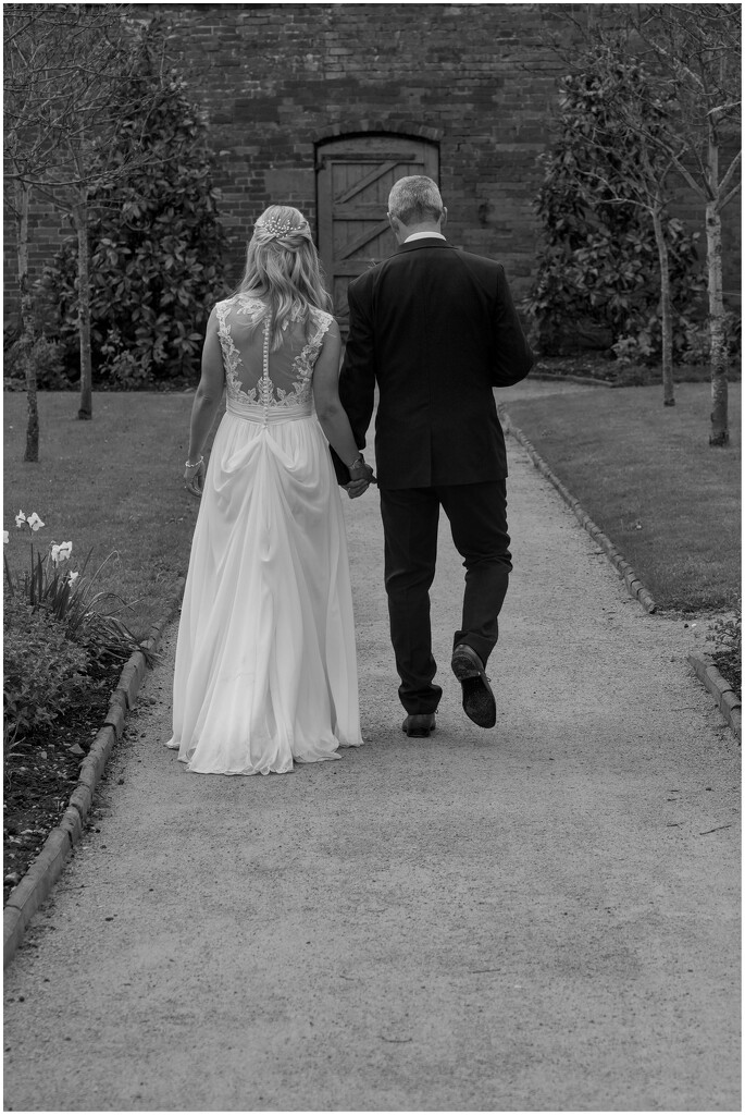 A quiet moment for the bride and groom   by phil_howcroft