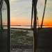 Sunset Between Train Cars