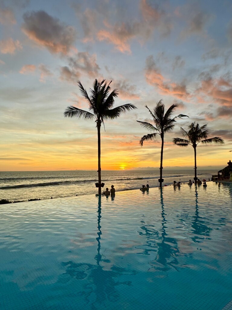 Pool and sea at sunset.  by cocobella